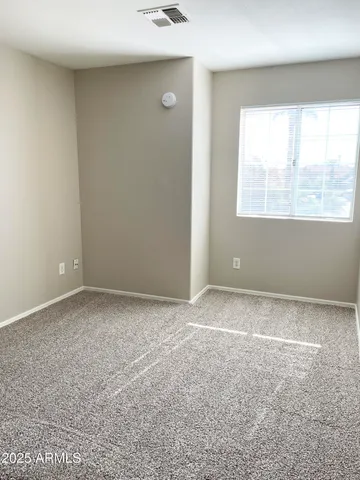 an empty room with a natural light