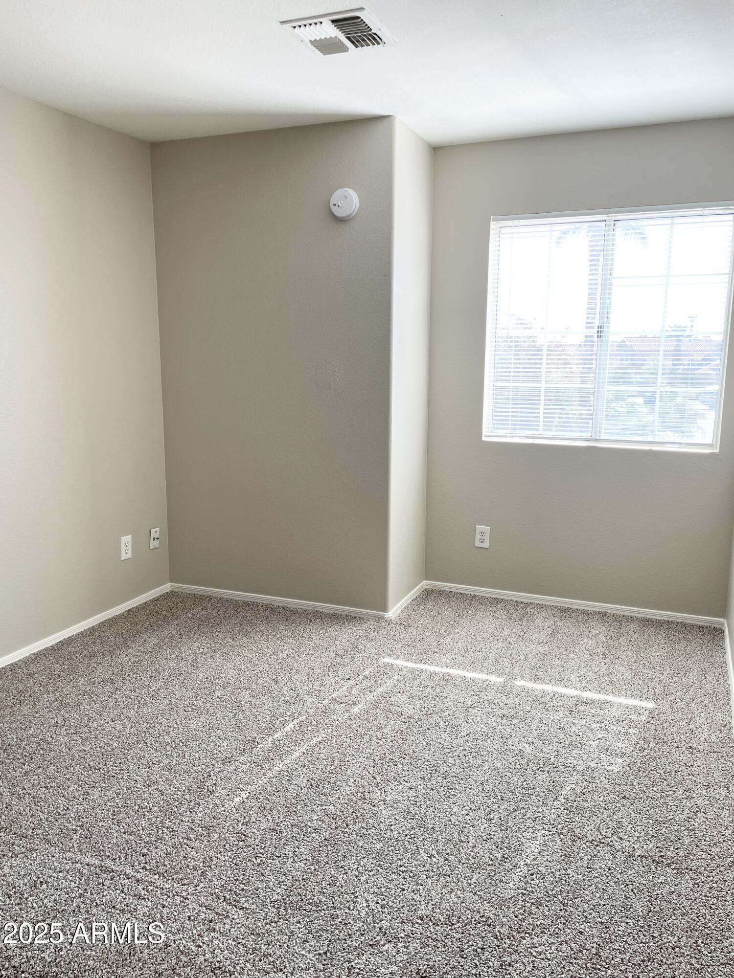 14452 South 43rd Street Phoenix, AZ 85044 - Photo 30 of 33 a view of an empty room and window