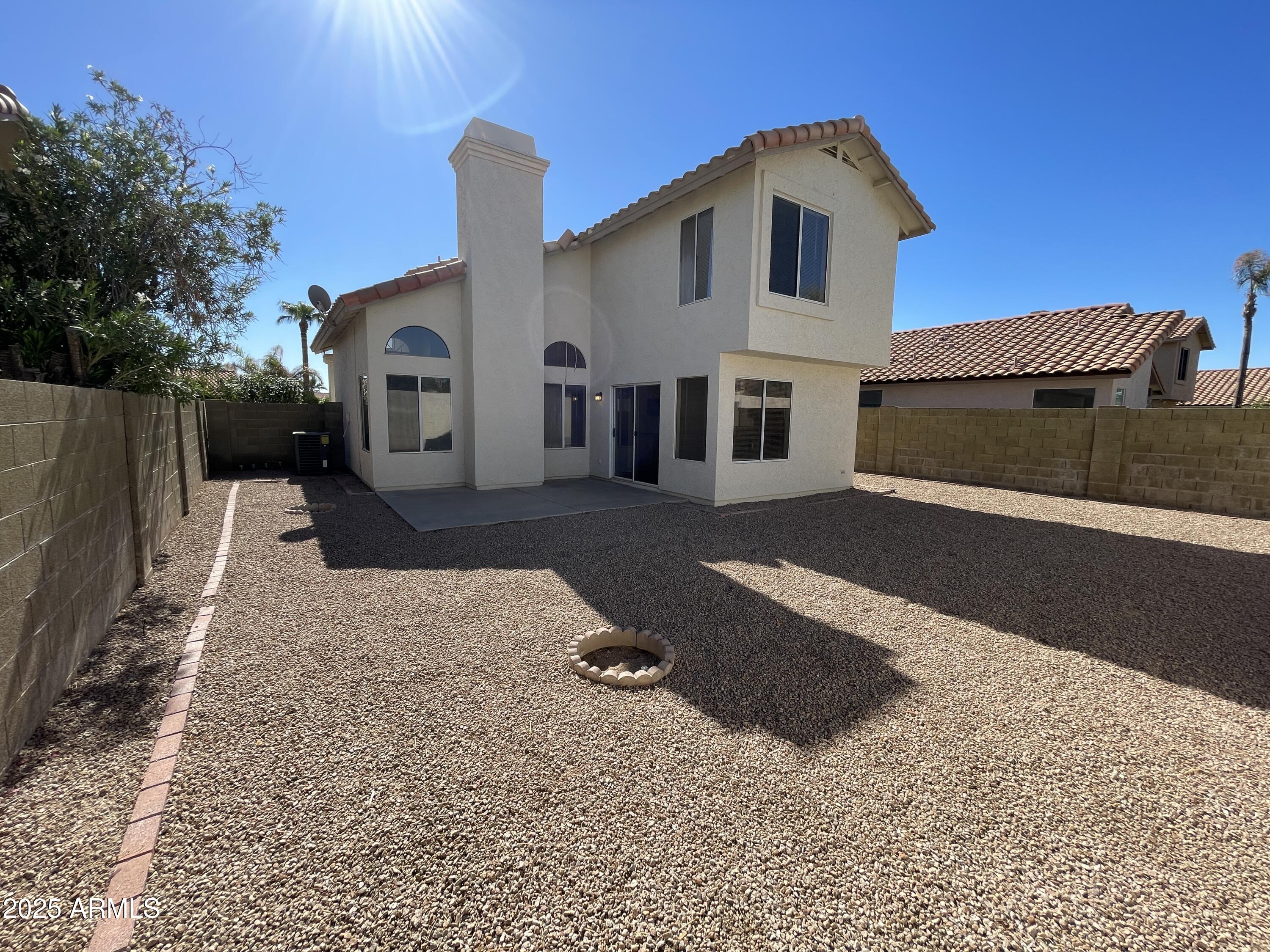 14452 South 43rd Street Phoenix, AZ 85044 - Photo 33 of 33 a front view of a house with a yard