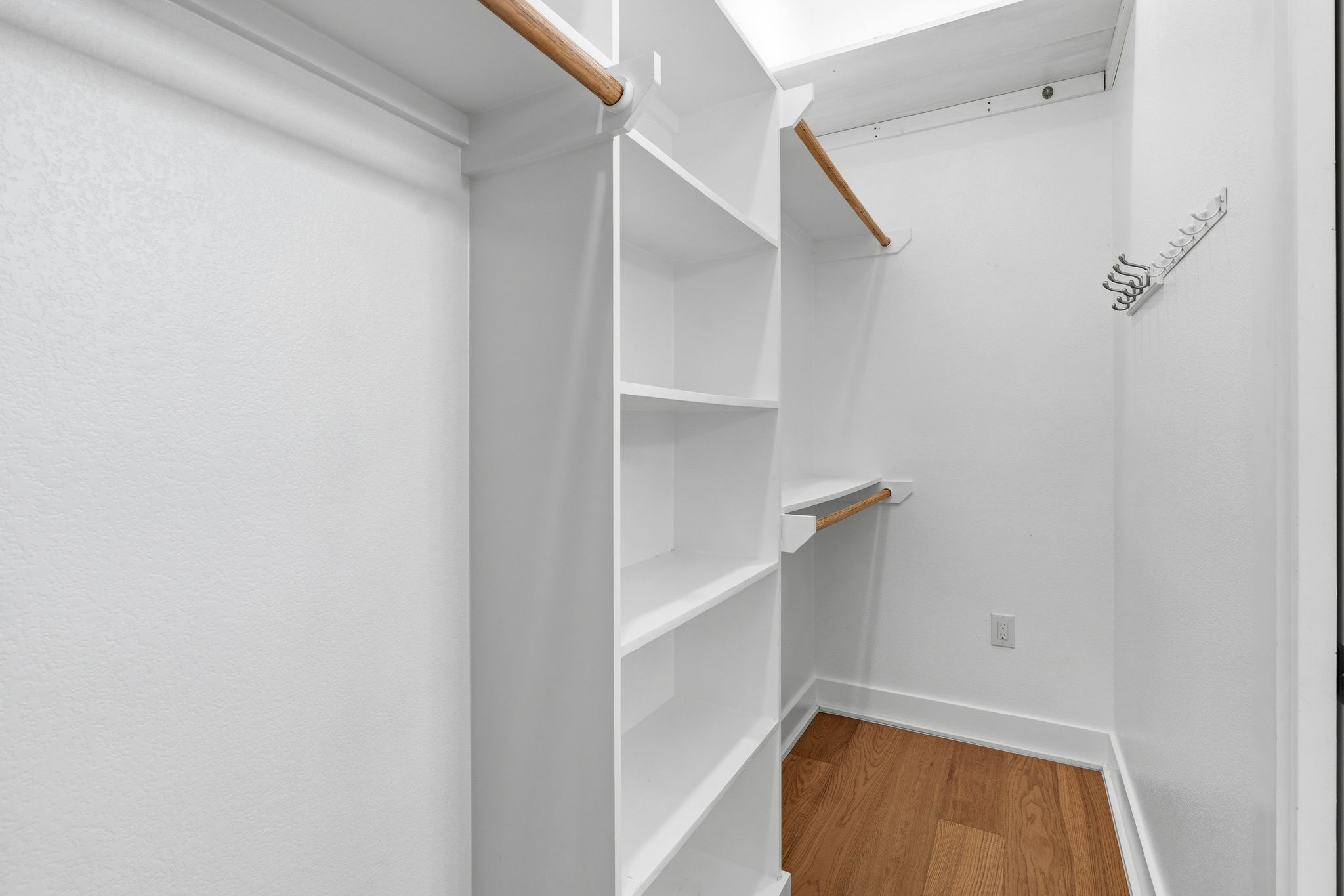 1409 Alegria Road, Unit B Austin, TX 78757 - Photo 21 of 39 a view of staircase with railing and white walls
