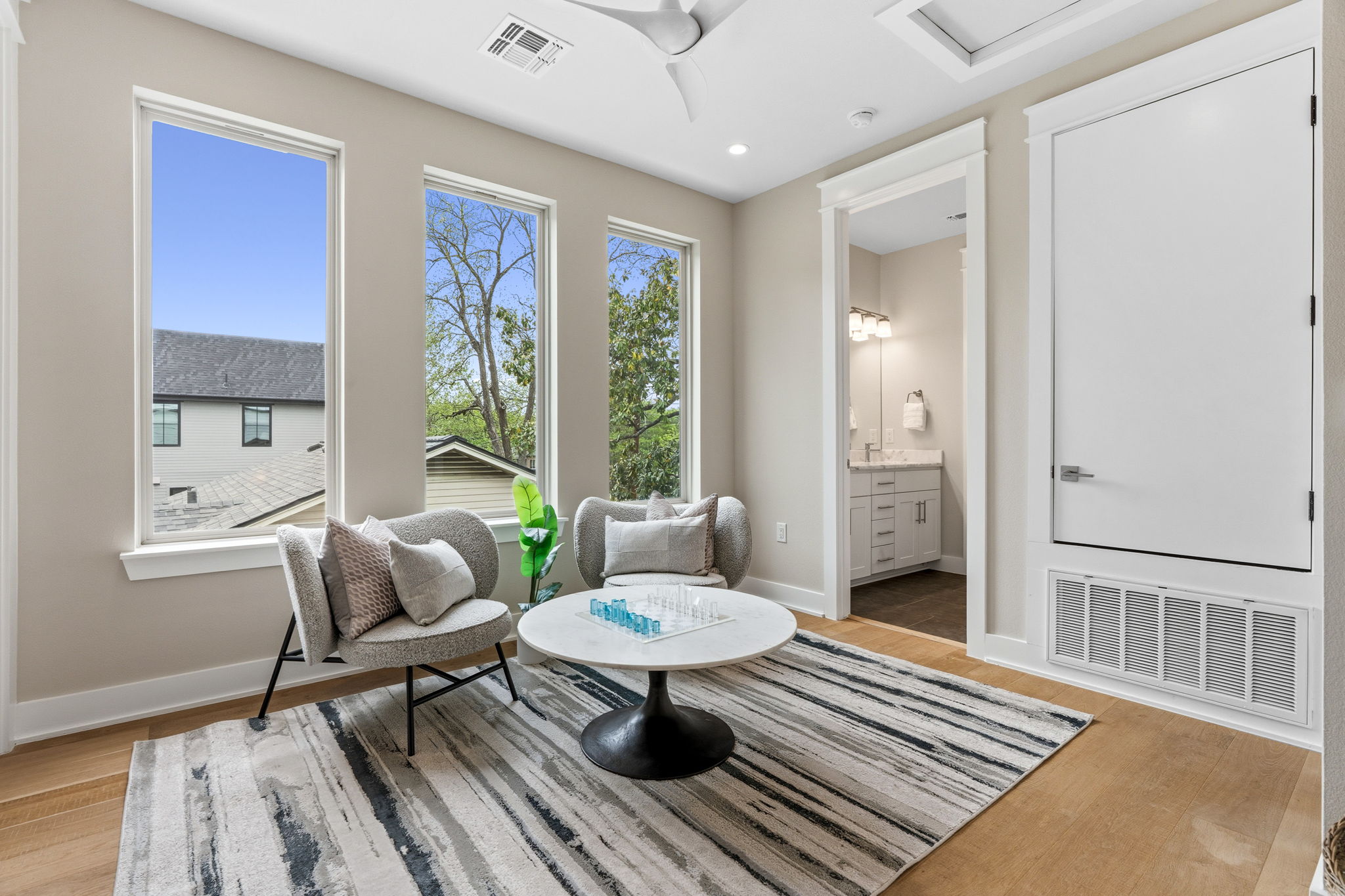 1409 Alegria Road, Unit B Austin, TX 78757 - Photo 23 of 39 a living room with furniture rug and window