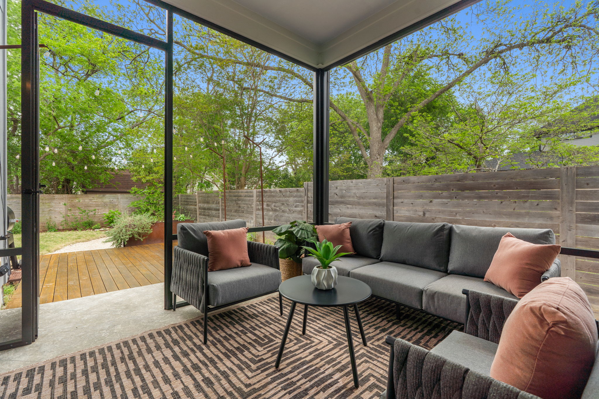 1409 Alegria Road, Unit B Austin, TX 78757 - Photo 30 of 39 a living room with furniture and a large window