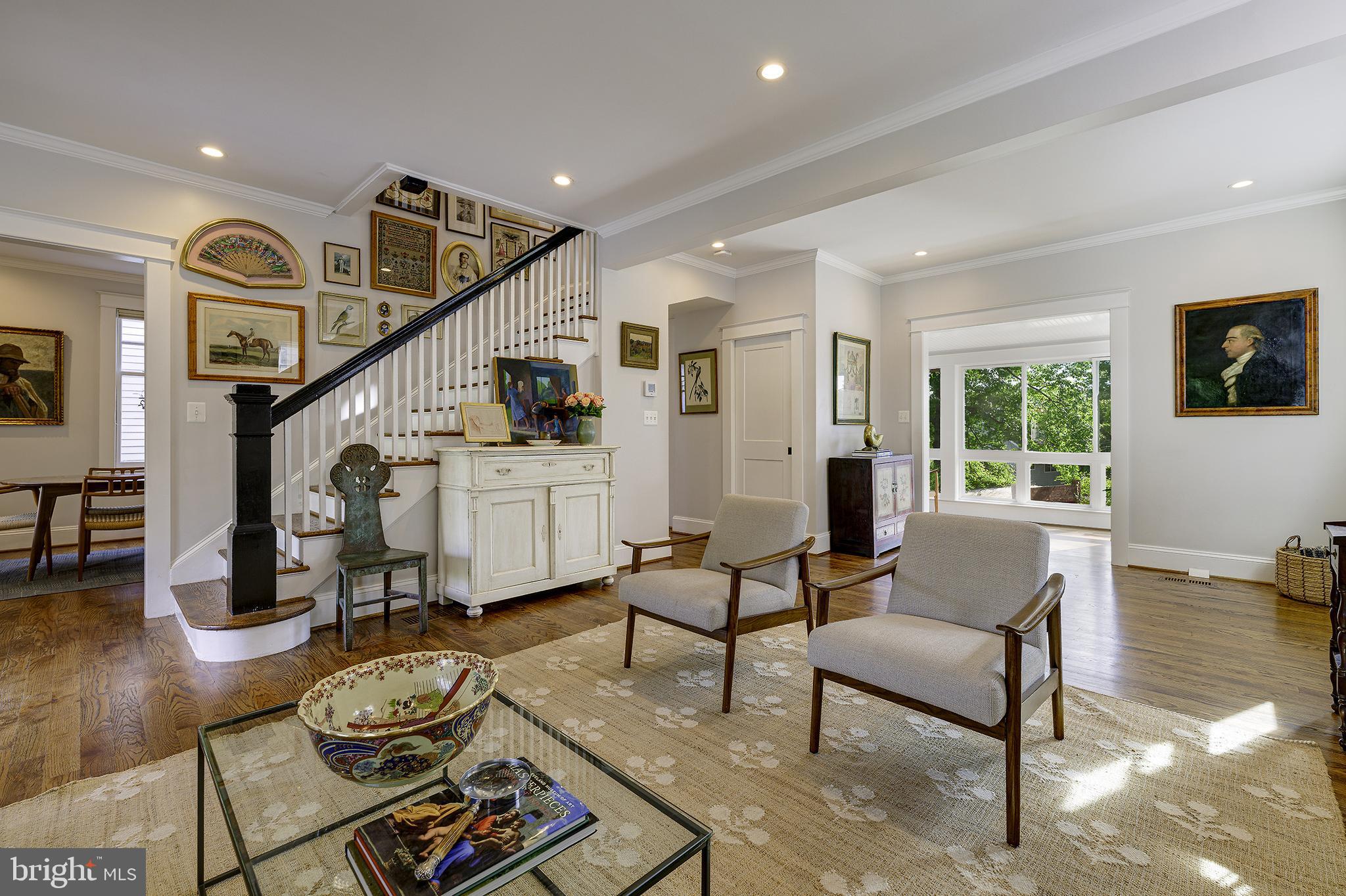 5710 Broad Branch Road Northwest Washington, DC 20015 - Photo 25 of 25 a living room with furniture and wooden floor