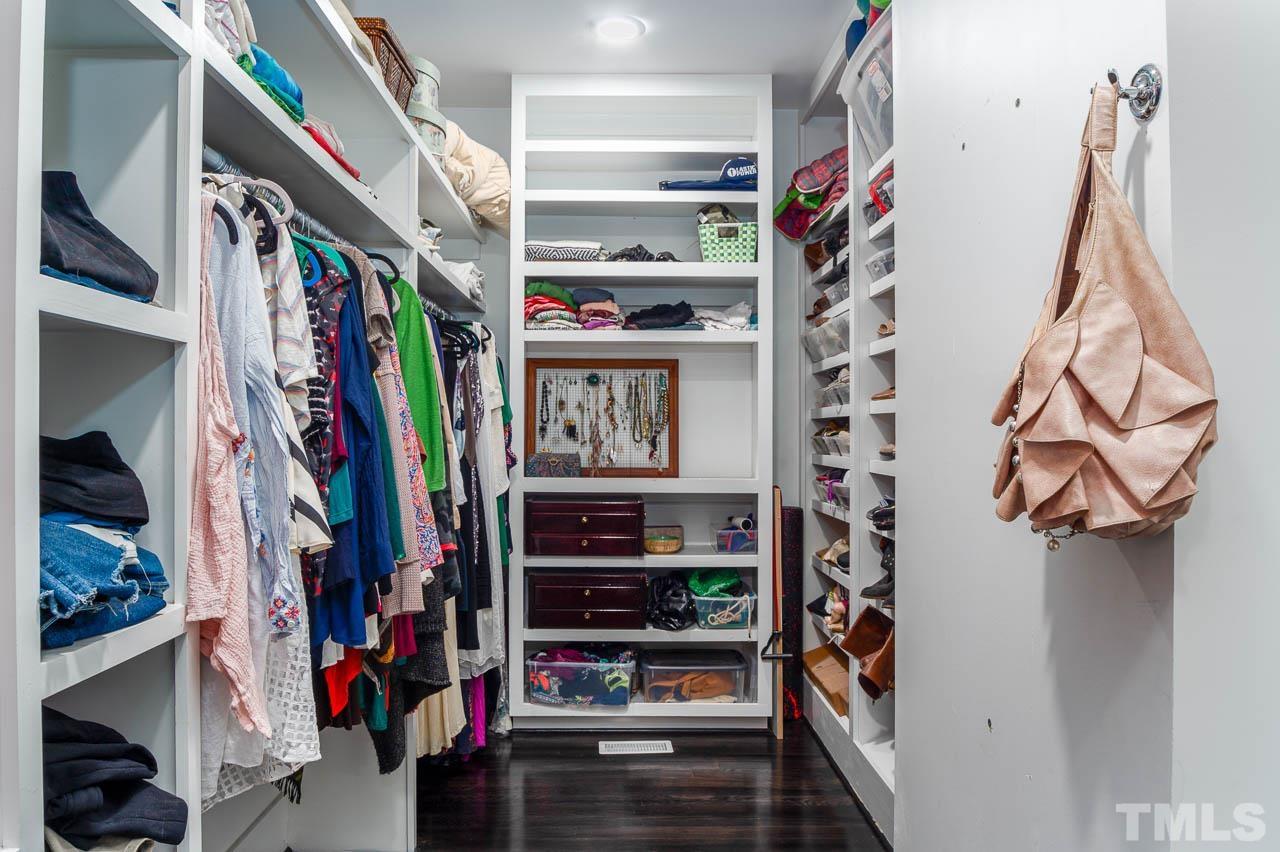 384 Booth Road Chapel Hill, NC 27516 - Photo 13 of 30 a view of walk in closet with clothes and shoes