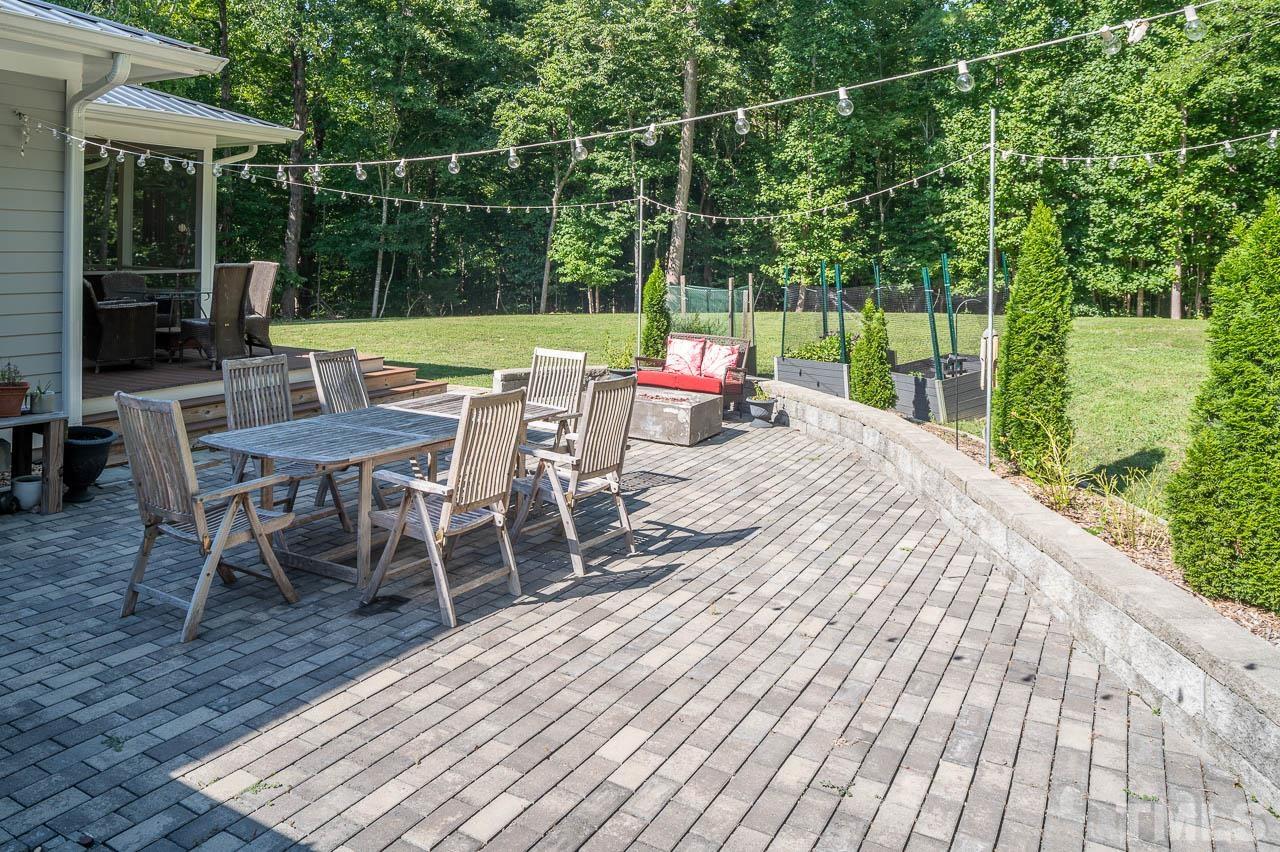384 Booth Road Chapel Hill, NC 27516 - Photo 26 of 30 a view of a chairs and table on the wooden floor