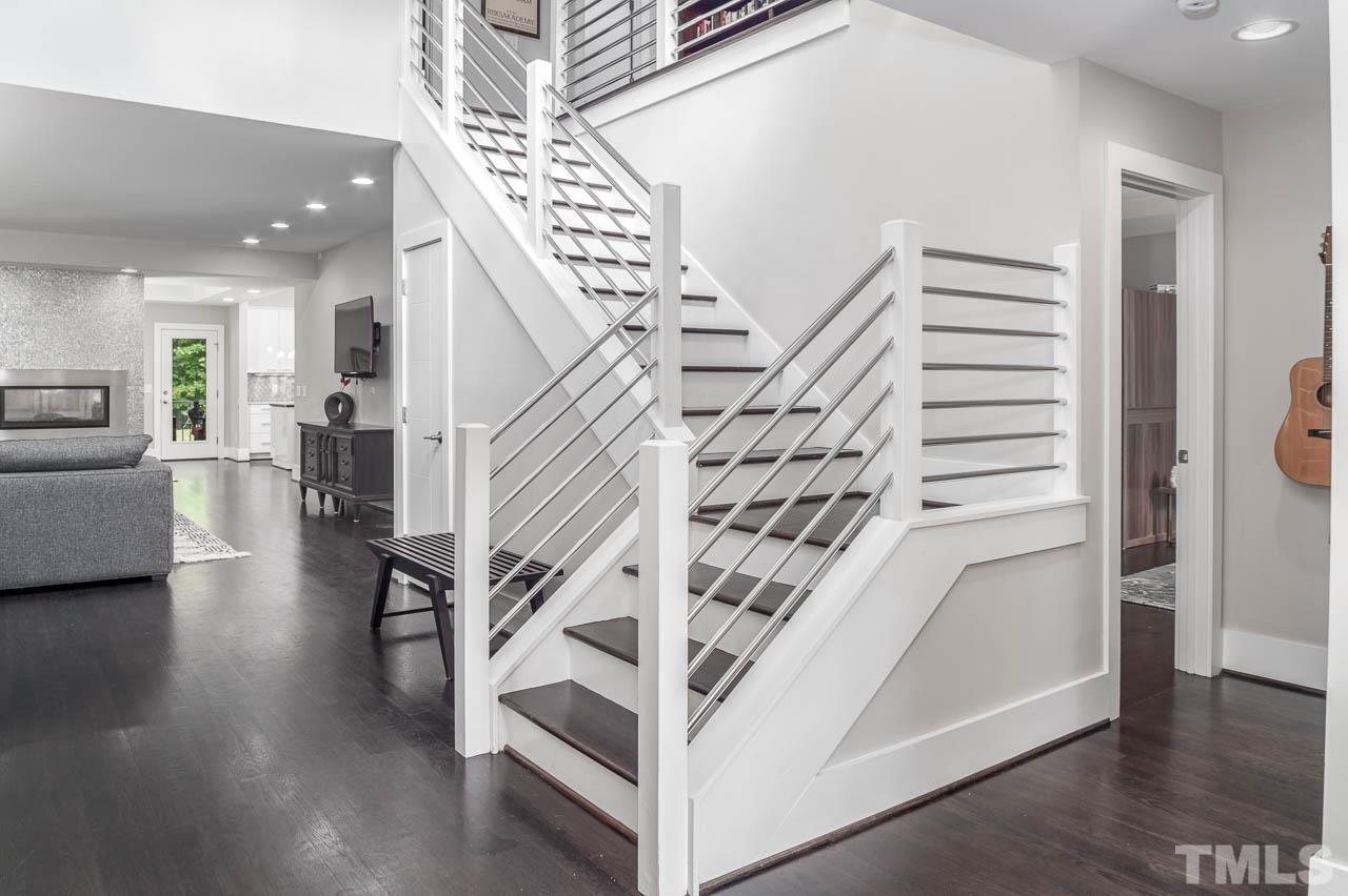384 Booth Road Chapel Hill, NC 27516 - Photo 4 of 30 a view of entryway and hall with wooden floor
