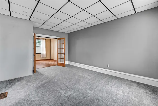 a view of empty room with windows