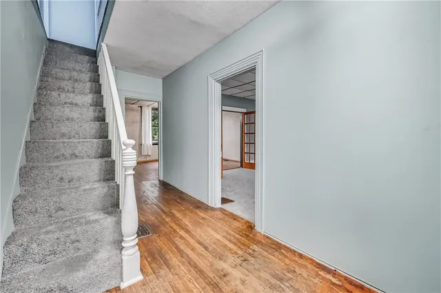 a view of a room with white walls