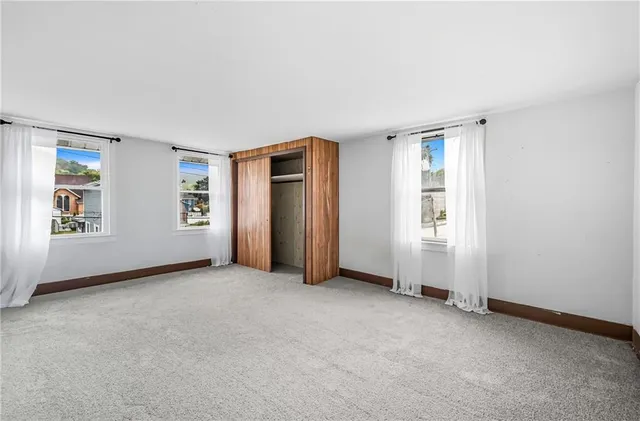 an empty room with closet