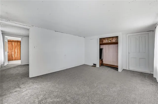 an empty room with closet