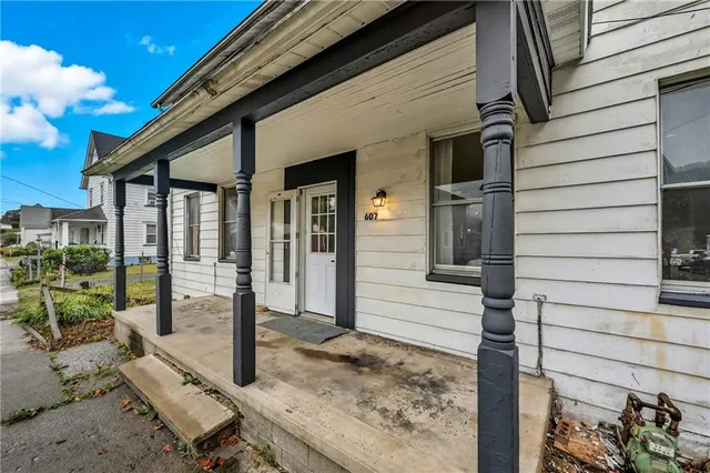 a front view of a house with a porch