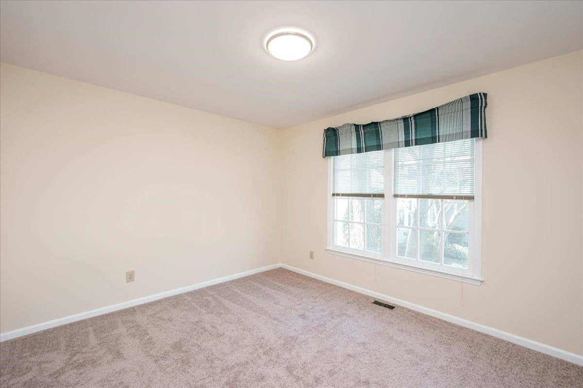 30 Renwick Court Raleigh, NC 27615 - Photo 18 of 31 First Floor Bedroom