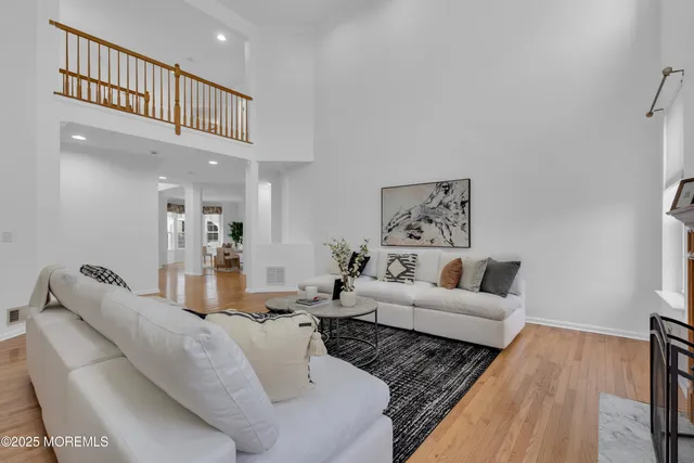 a living room with furniture and a rug