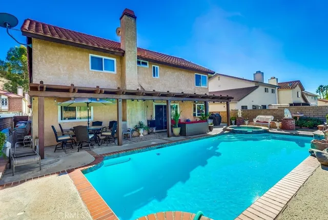 a outdoor living space with furniture and outdoor view