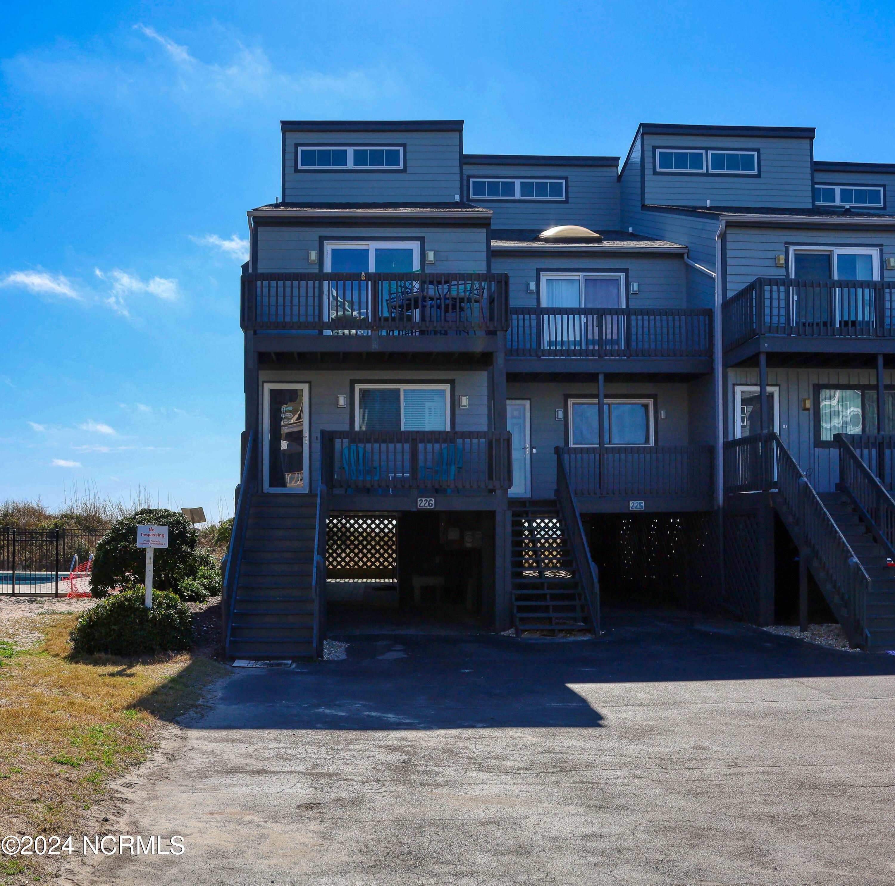 1928 New River Inlet Road, Unit 226 North Topsail Beach, NC 28460 - Photo 1 of 48 Front 2