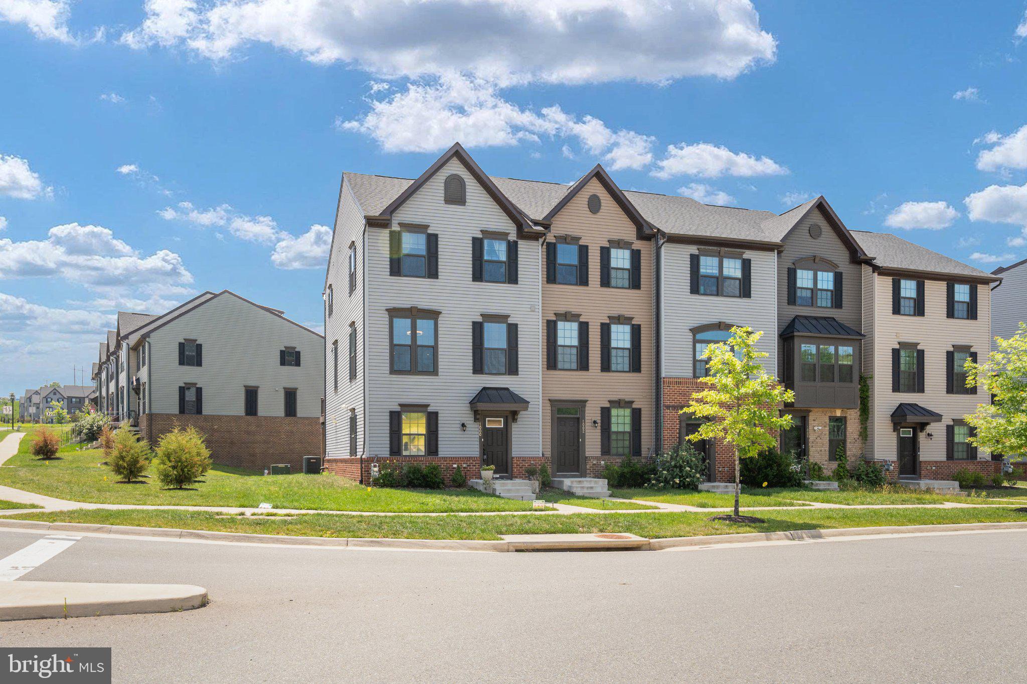 1000 Alum Spring Road Fredericksburg, VA 22401 - Photo 33 of 47 Charming townhomes under blue skies.