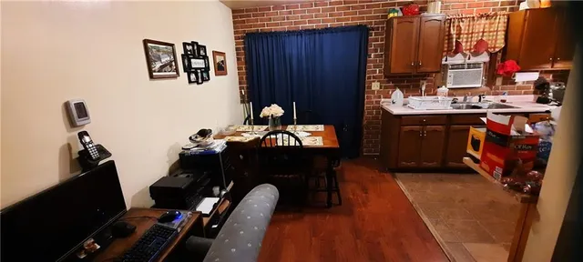 a view of a kitchen with appliances and a car