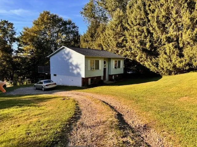 a house view with a swimming pool