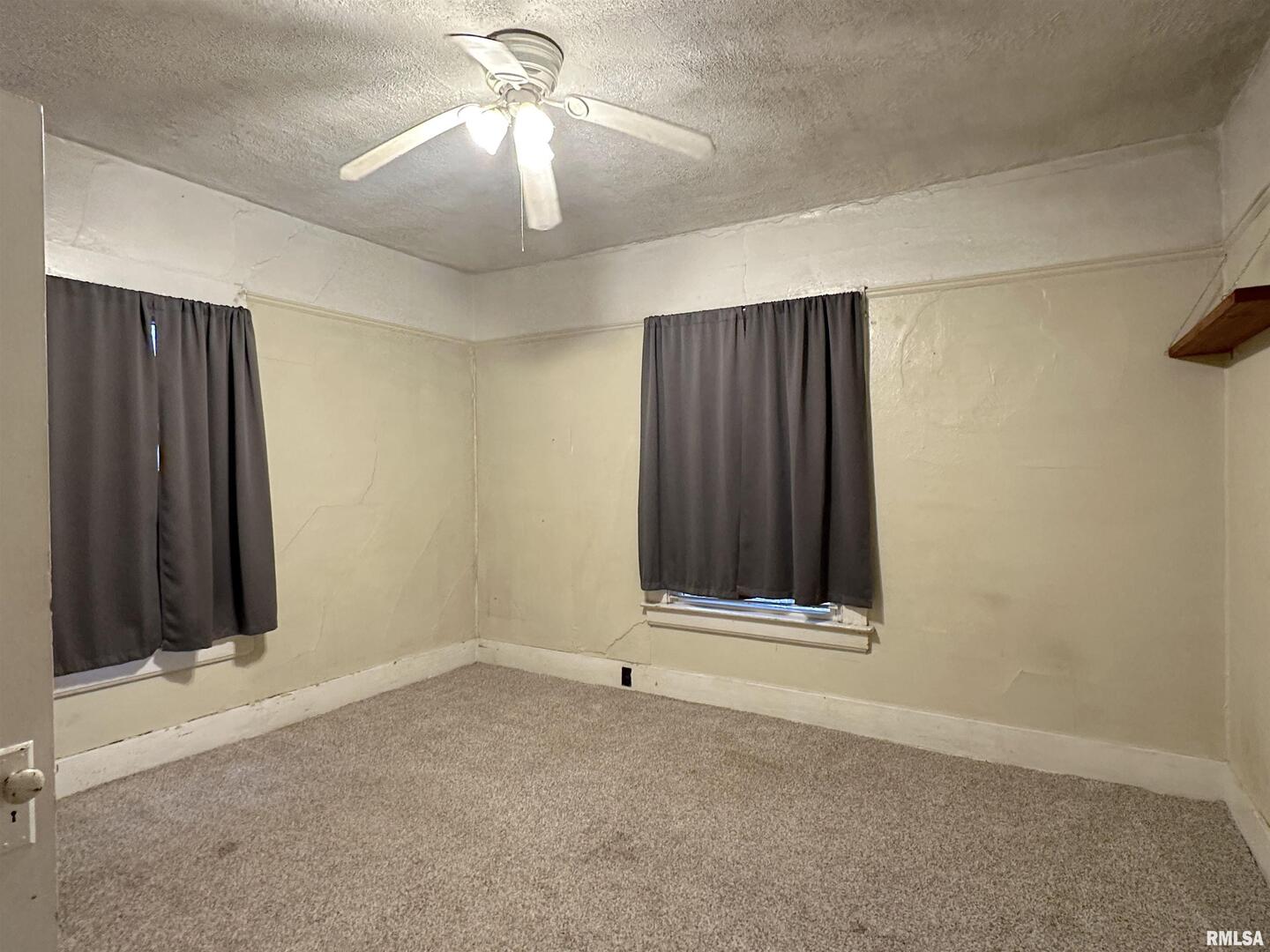 405 West College Street Carbondale, IL 62901 - Photo 12 of 18 an empty room with closet area