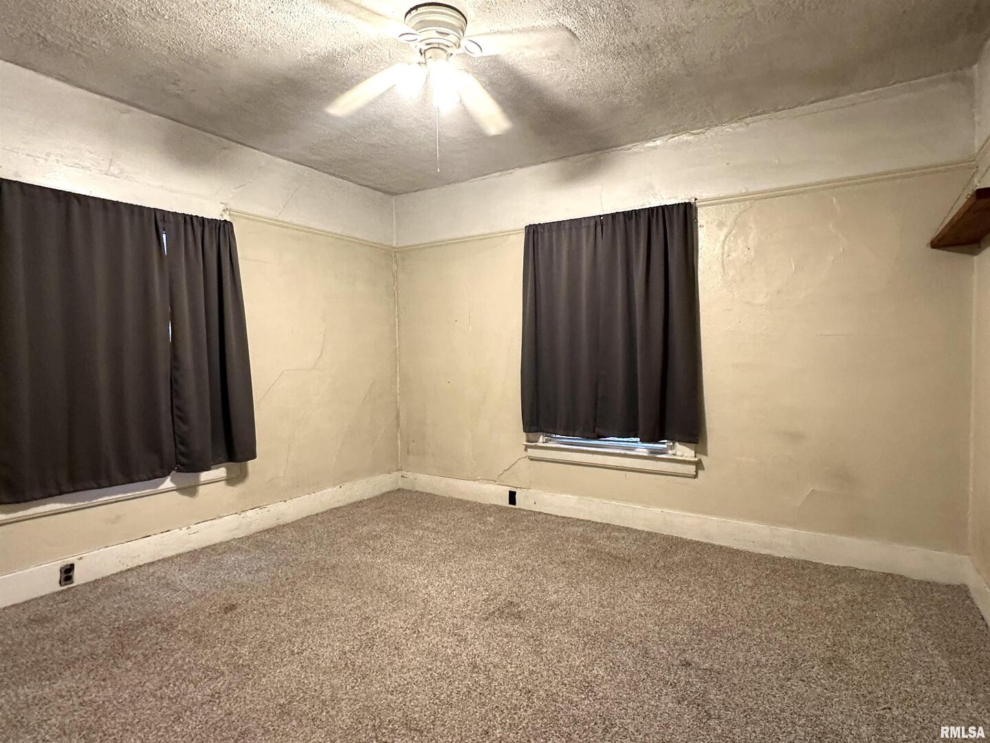 405 West College Street Carbondale, IL 62901 - Photo 13 of 18 a view of an empty room with a window