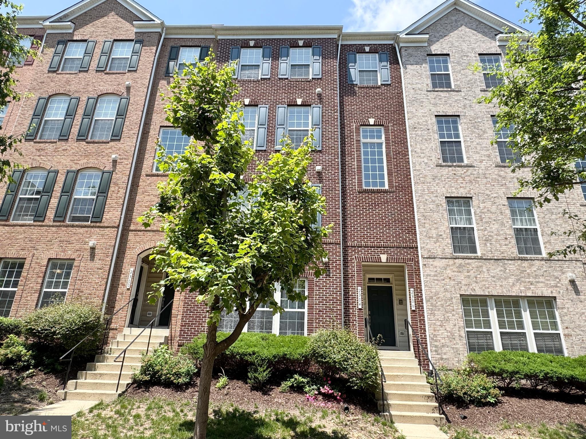 a front view of a multi story residential apartment building