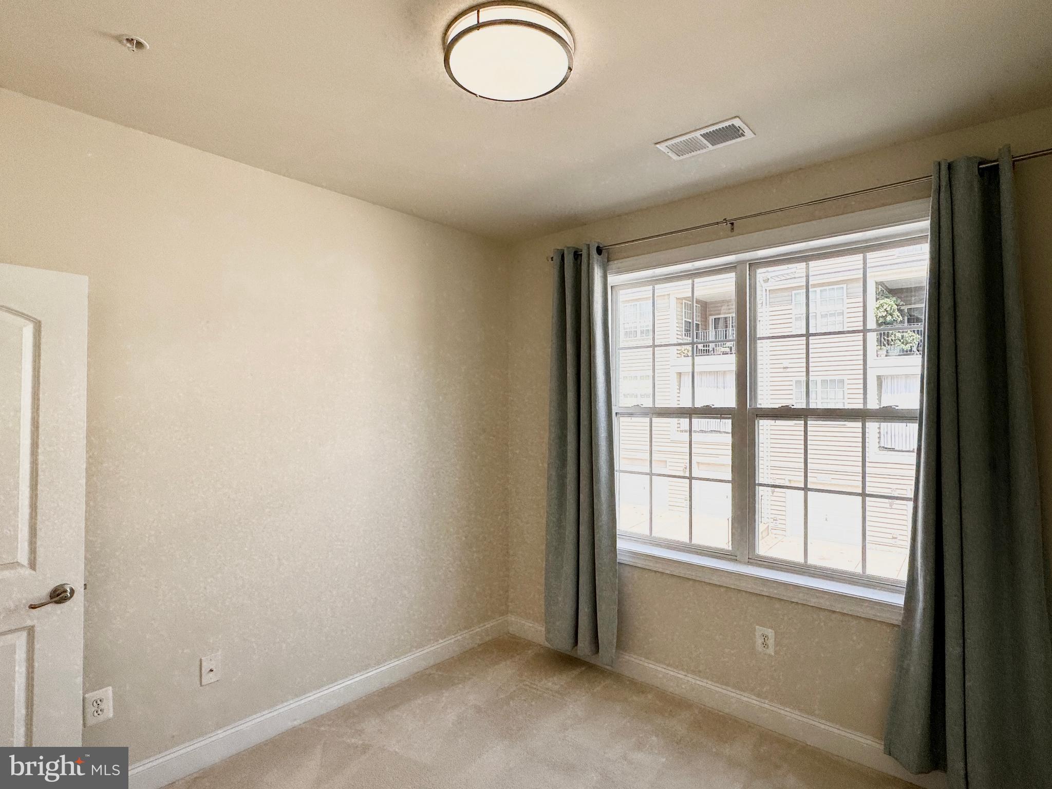 2304 Margraf Circle Woodbridge, VA 22191 - Photo 19 of 27 an empty room with windows