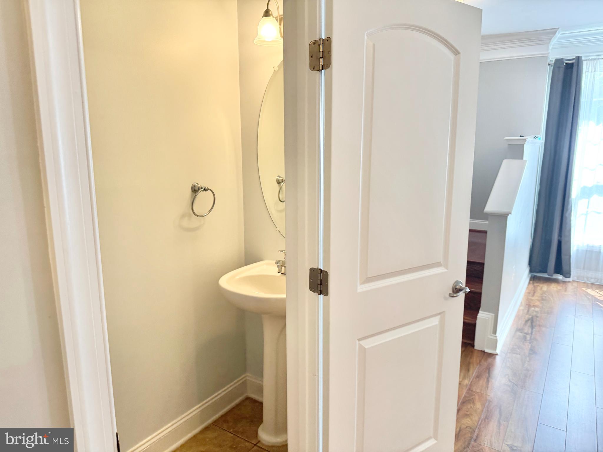 2304 Margraf Circle Woodbridge, VA 22191 - Photo 10 of 27 a bathroom with a sink and a mirror