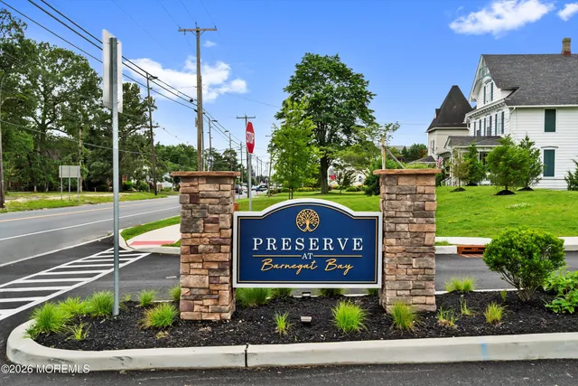 a sign on the side of a street