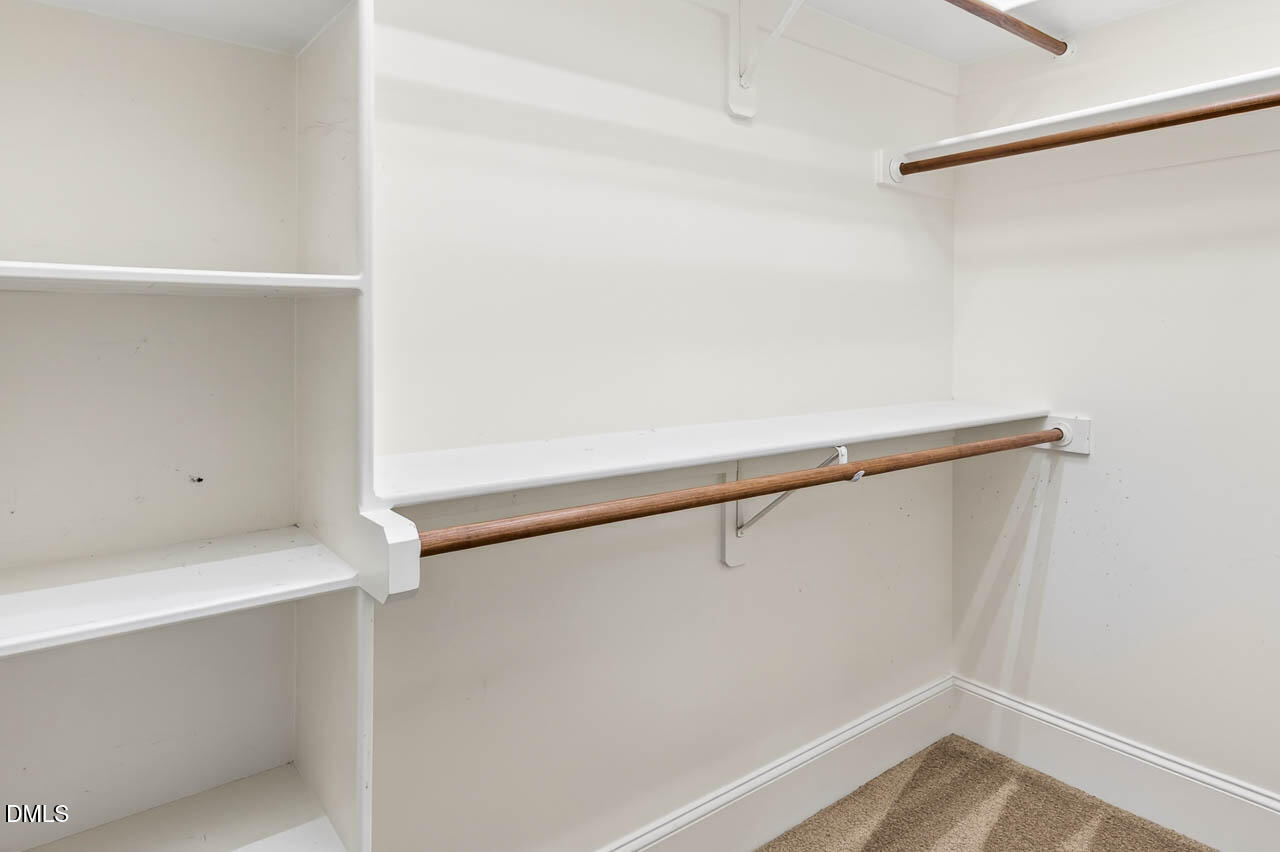 2209 Lodestar Drive Raleigh, NC 27615 - Photo 18 of 50 a view of walk in closet