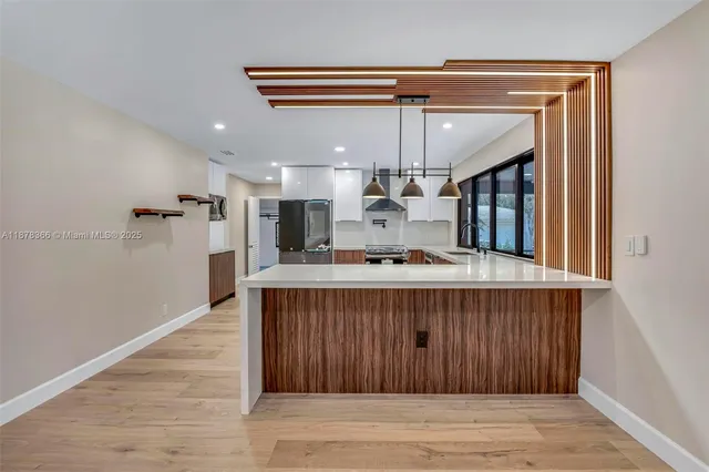 a bathroom with a toilet a sink and a mirror