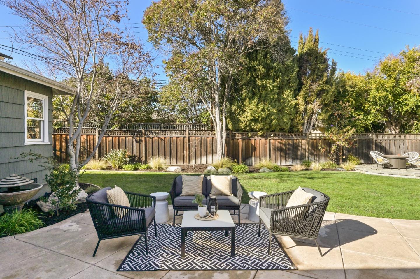 416 Stephen Road San Mateo, CA 94403 - Photo 2 of 11 a view of backyard with seating area and green space