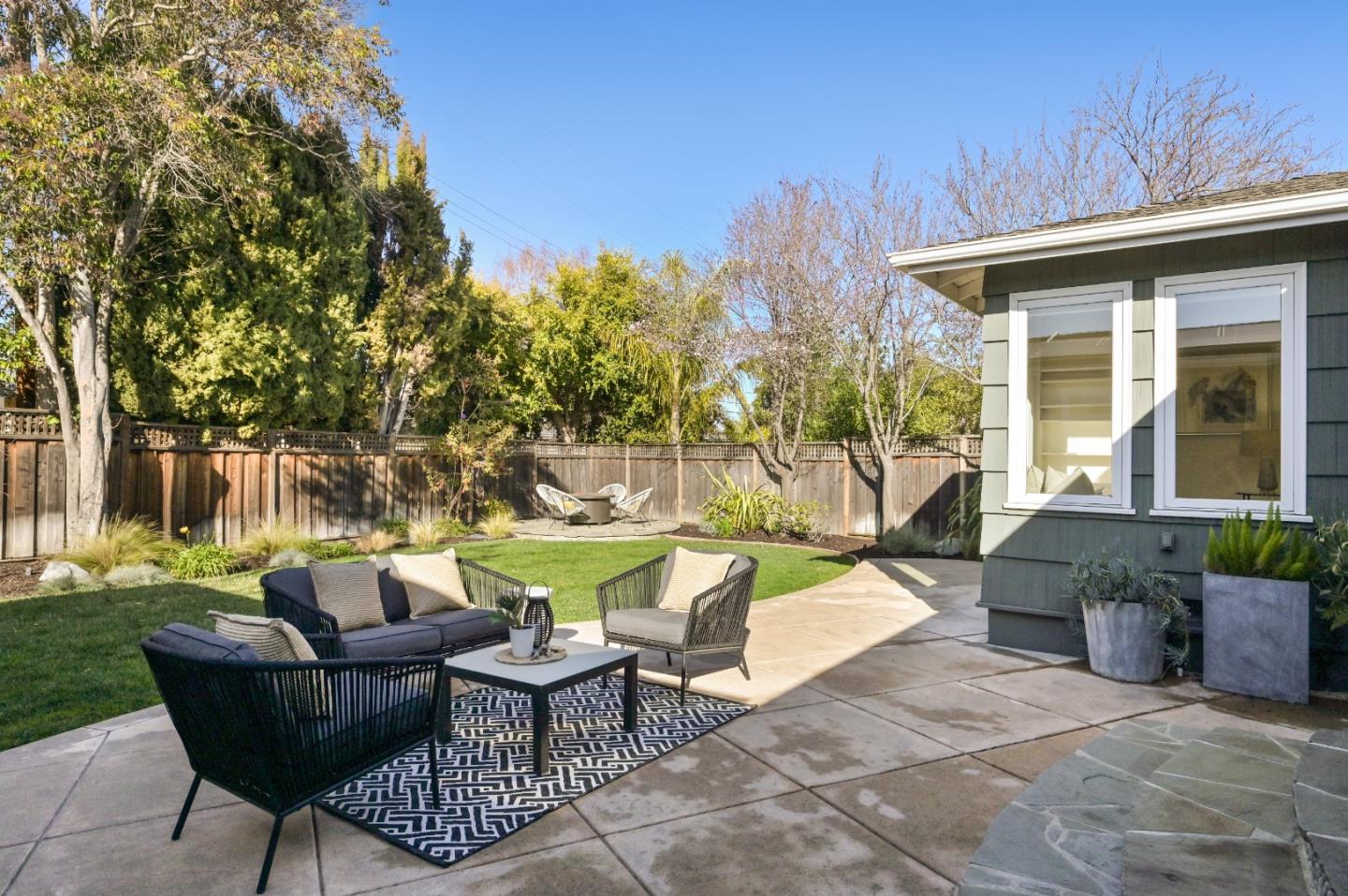 416 Stephen Road San Mateo, CA 94403 - Photo 4 of 11 a backyard of a house with outdoor seating