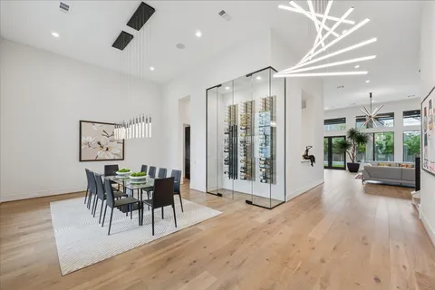 a view of a dining room with furniture and window