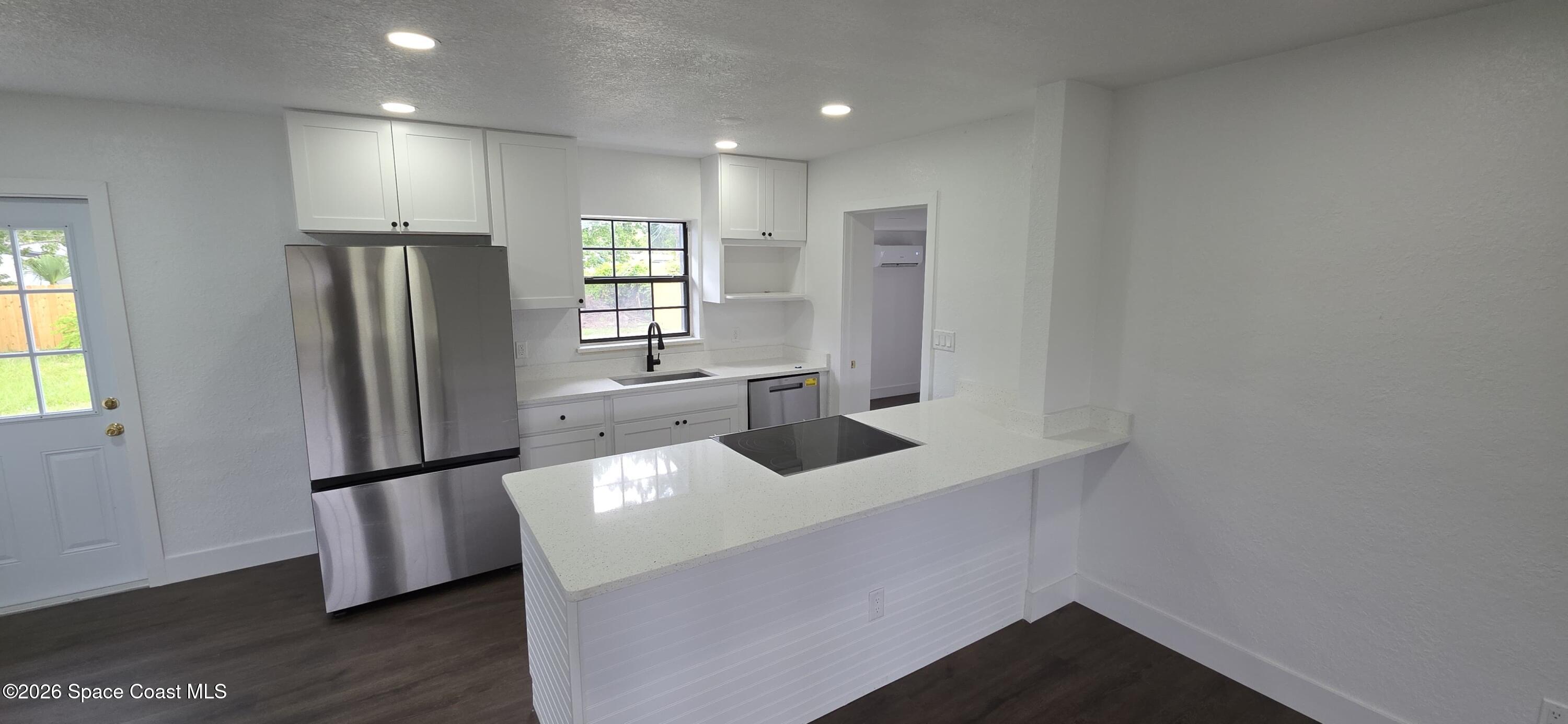 4785 Tuscarora Road Titusville, FL 32780 - Photo 4 of 10 9debf4a2-bde7-4843-a927-33e2bdcd6c0a