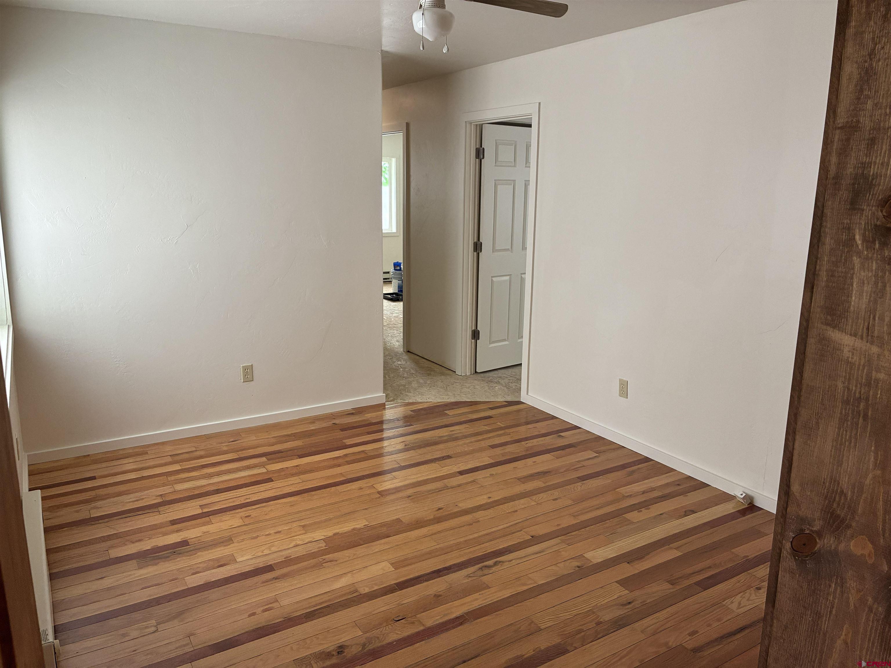 4491 2300th Road Delta, CO 81416 - Photo 13 of 25 a view of room with wooden floor