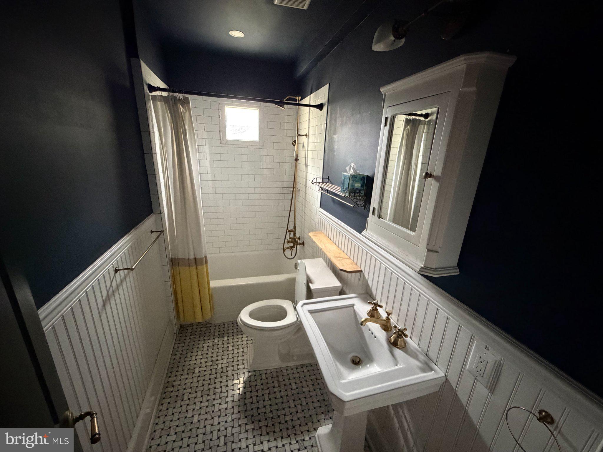 815 South 49th Street Philadelphia, PA 19143 - Photo 44 of 72 a view of a hallway with wooden floor and glass door