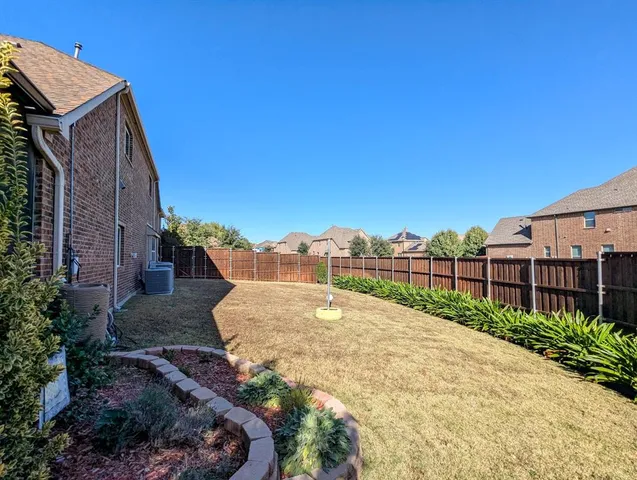 a view of a backyard with plants