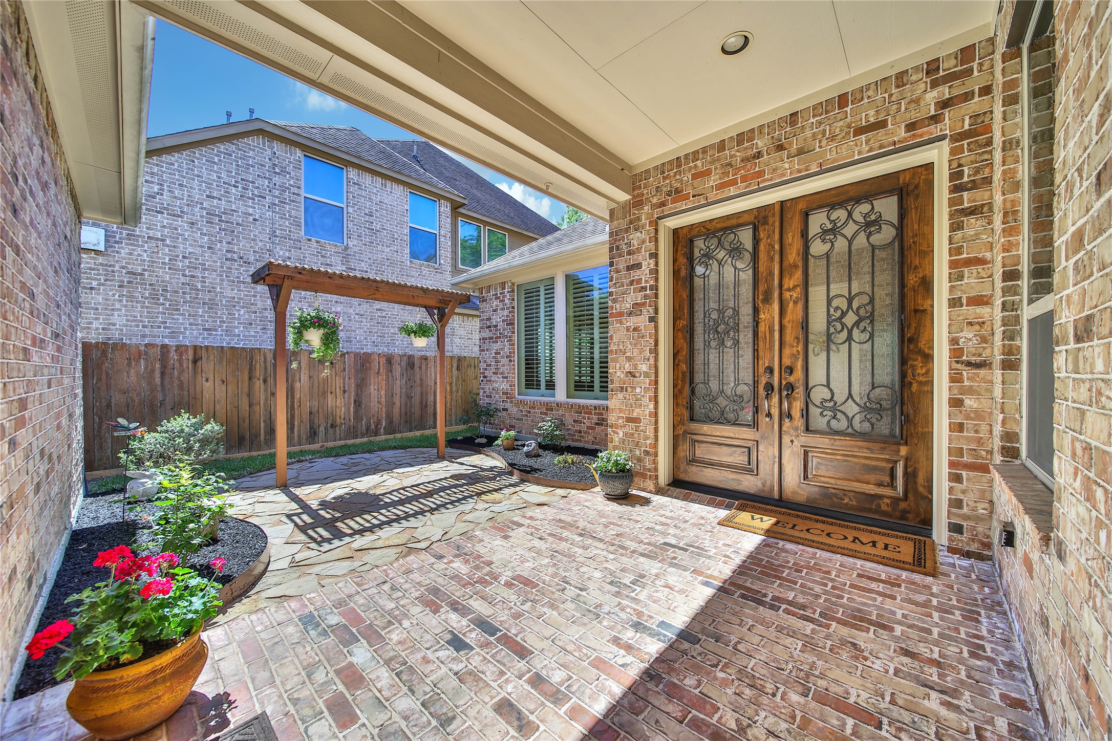 3234 Explorer Way Conroe, TX 77301 - Photo 8 of 46 Designed for indoor-outdoor living, the courtyard is perfect for relaxing or entertaining guests.