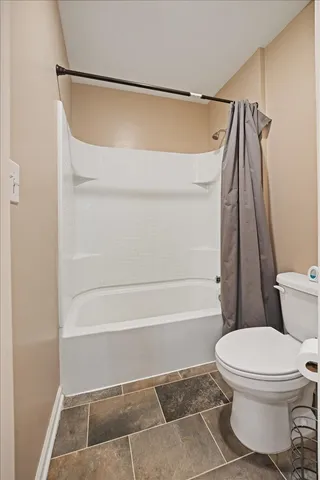 a bathroom with a double vanity sink and mirror