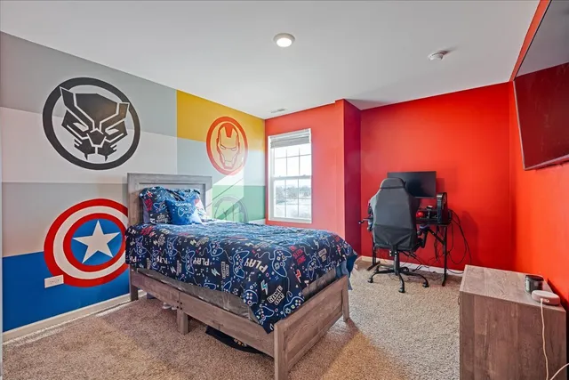 a view of a patio with table and chairs