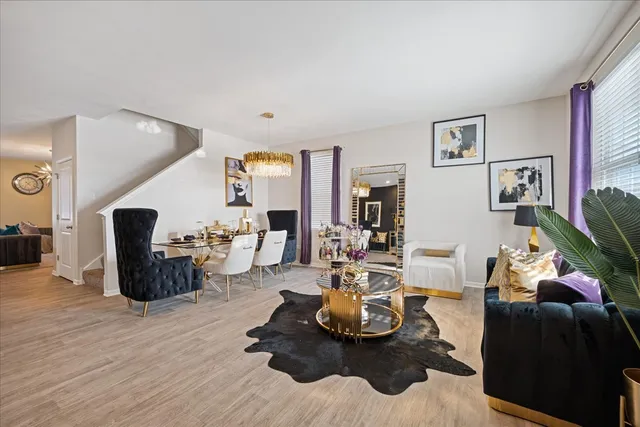 a work room with furniture and wooden floor