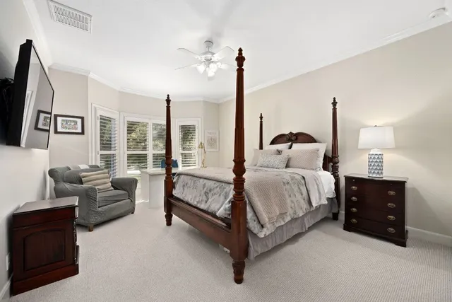 a bathroom with a toilet sink a shower and a mirror