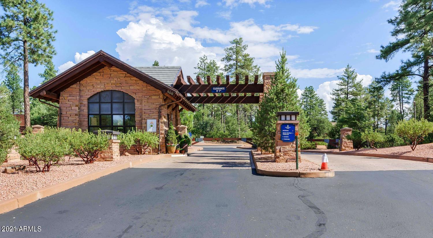 603 Club Drive, Unit 3 Payson, AZ 85541 - Photo 2 of 25 a front view of a house with a yard