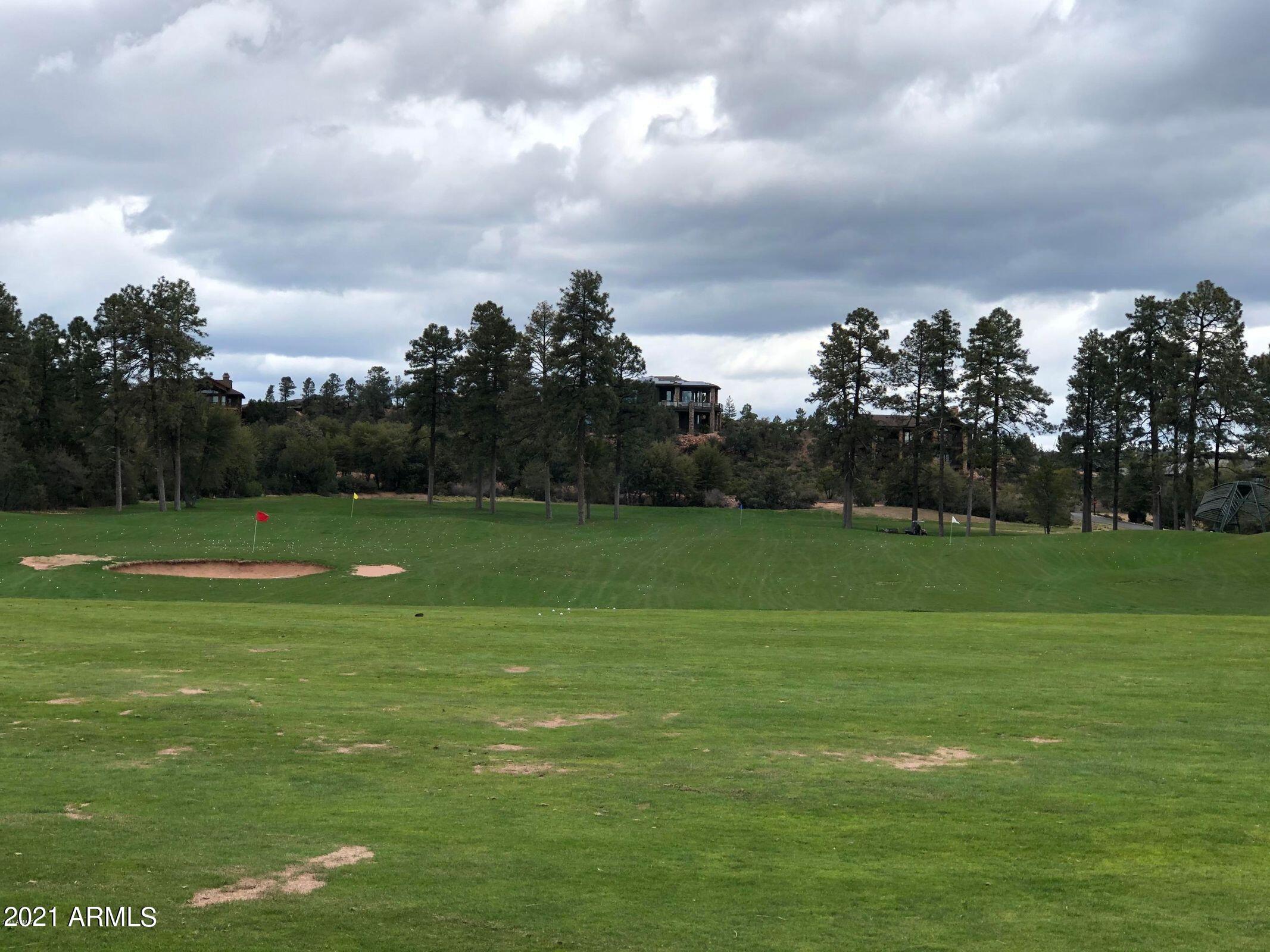603 Club Drive, Unit 3 Payson, AZ 85541 - Photo 22 of 25 a view of a golf course with a garden