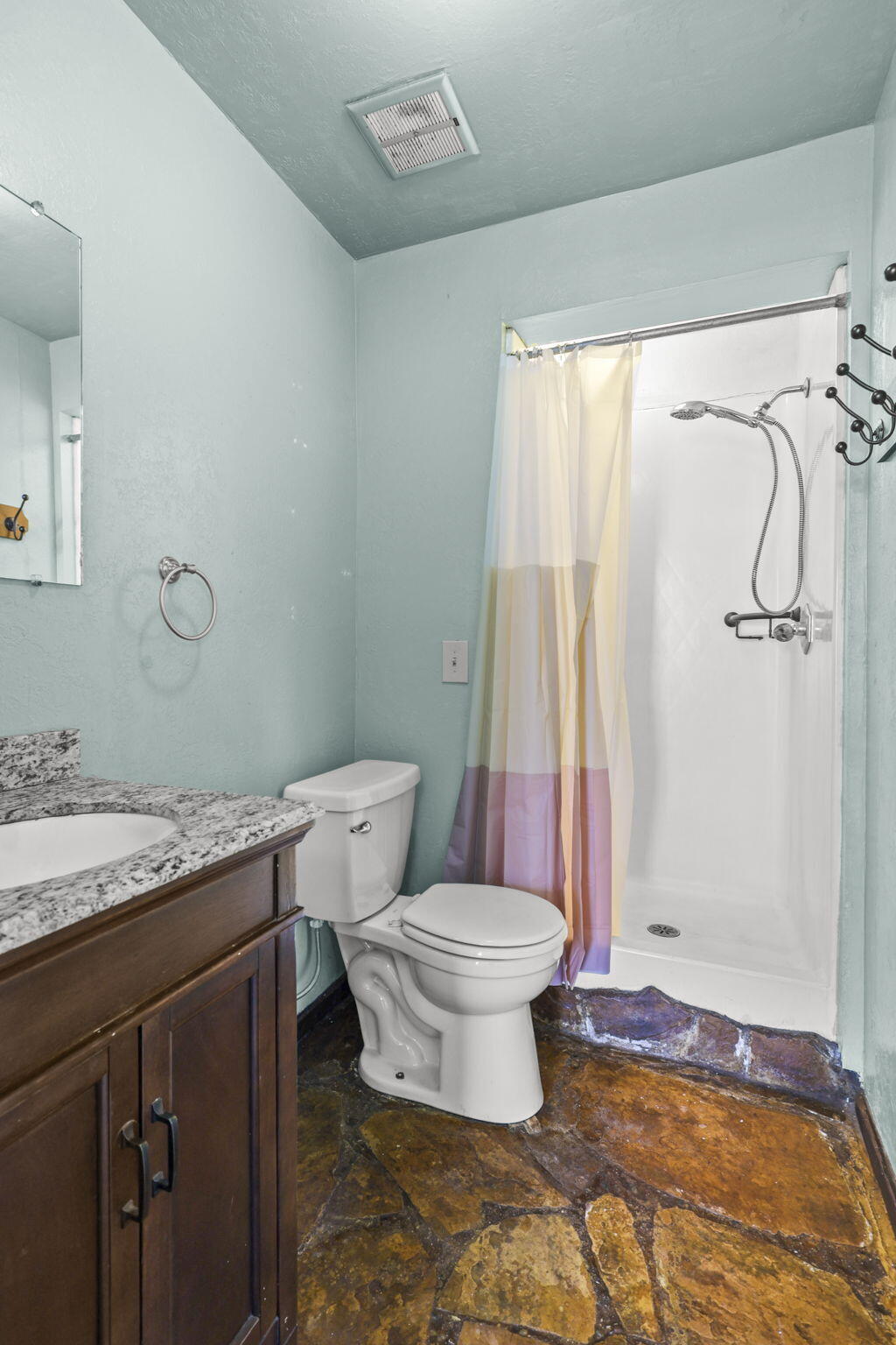 5040 Wilson Hill Road Manton, CA 96059 - Photo 14 of 37 a bathroom with a granite countertop sink toilet and shower