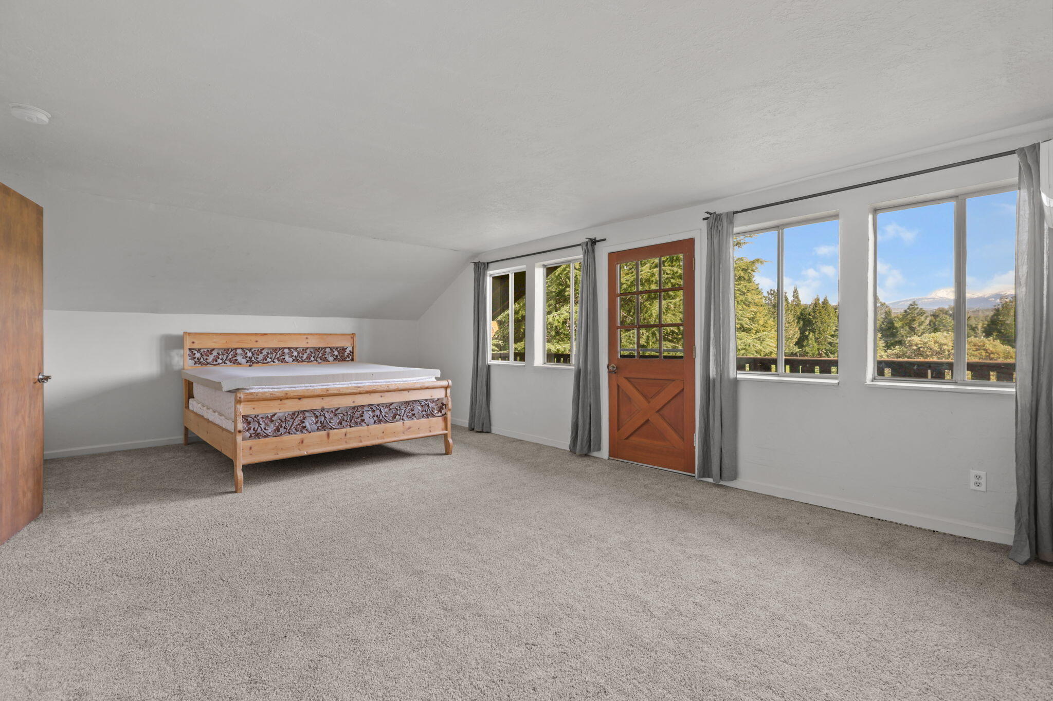 5040 Wilson Hill Road Manton, CA 96059 - Photo 15 of 37 a view of an empty room with a window