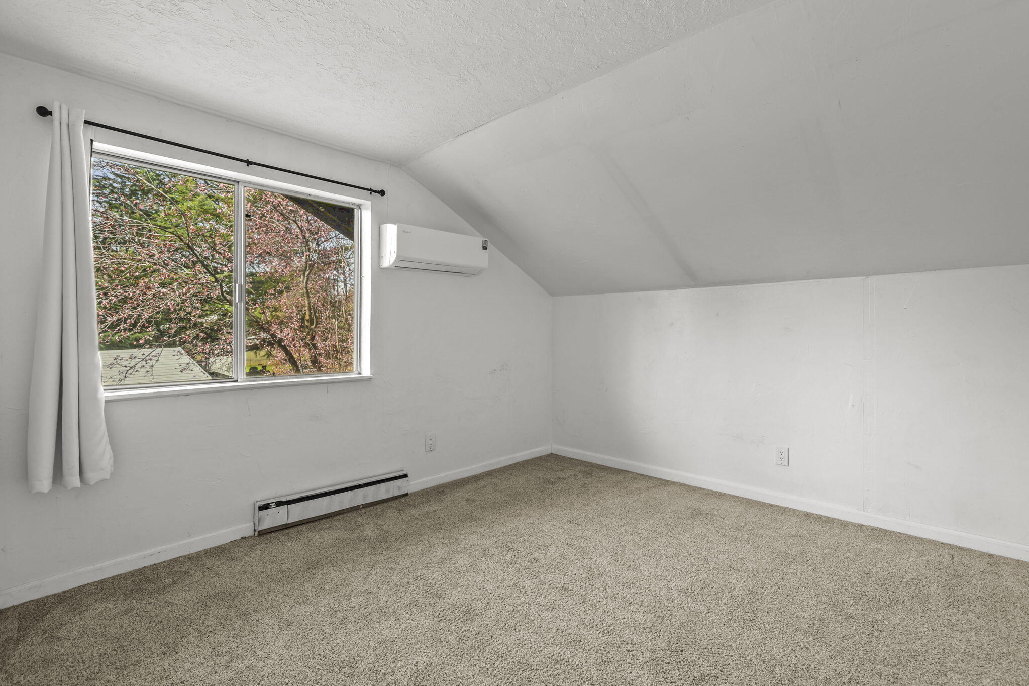5040 Wilson Hill Road Manton, CA 96059 - Photo 18 of 37 an empty room with a window