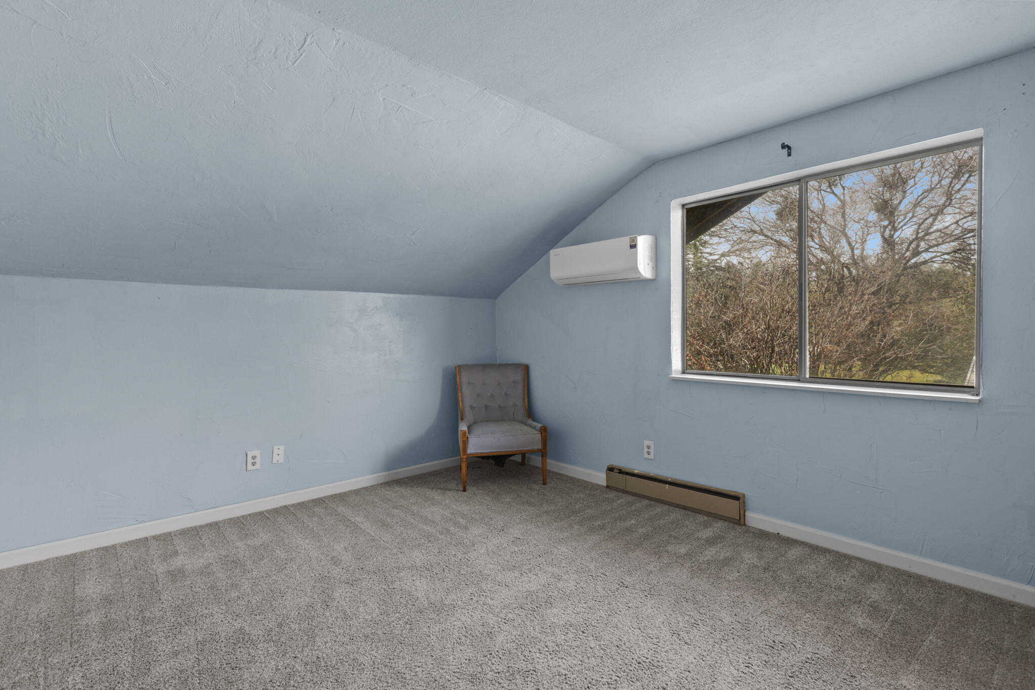 5040 Wilson Hill Road Manton, CA 96059 - Photo 20 of 37 an empty room with a window