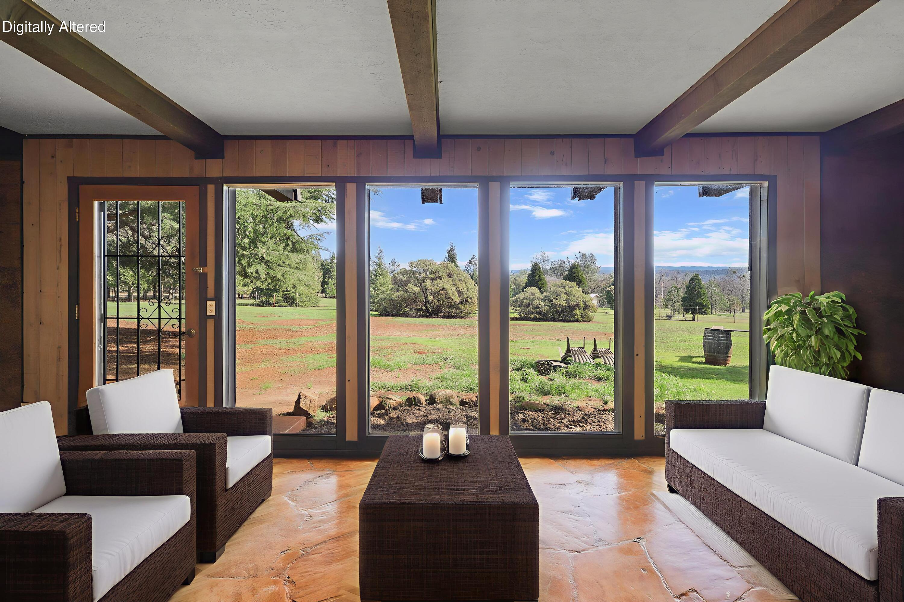 5040 Wilson Hill Road Manton, CA 96059 - Photo 2 of 37 a living room with furniture and floor to ceiling windows