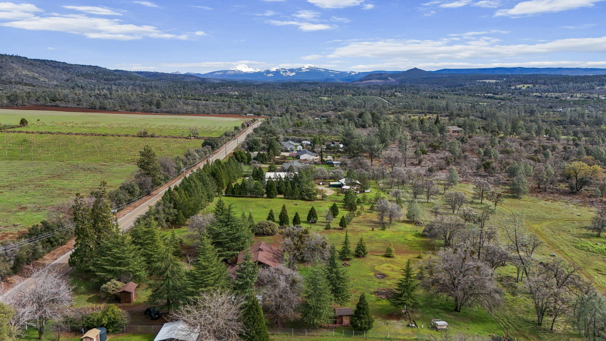 5040 Wilson Hill Road Manton, CA 96059 - Photo 25 of 37 a view of a city with mountains in the background